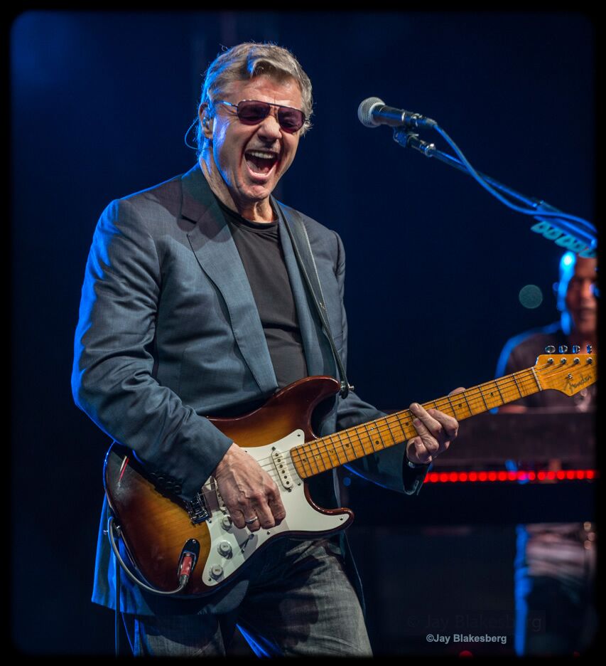 photo of Steve Miller from the Steve Miller Band, onstage with guitar