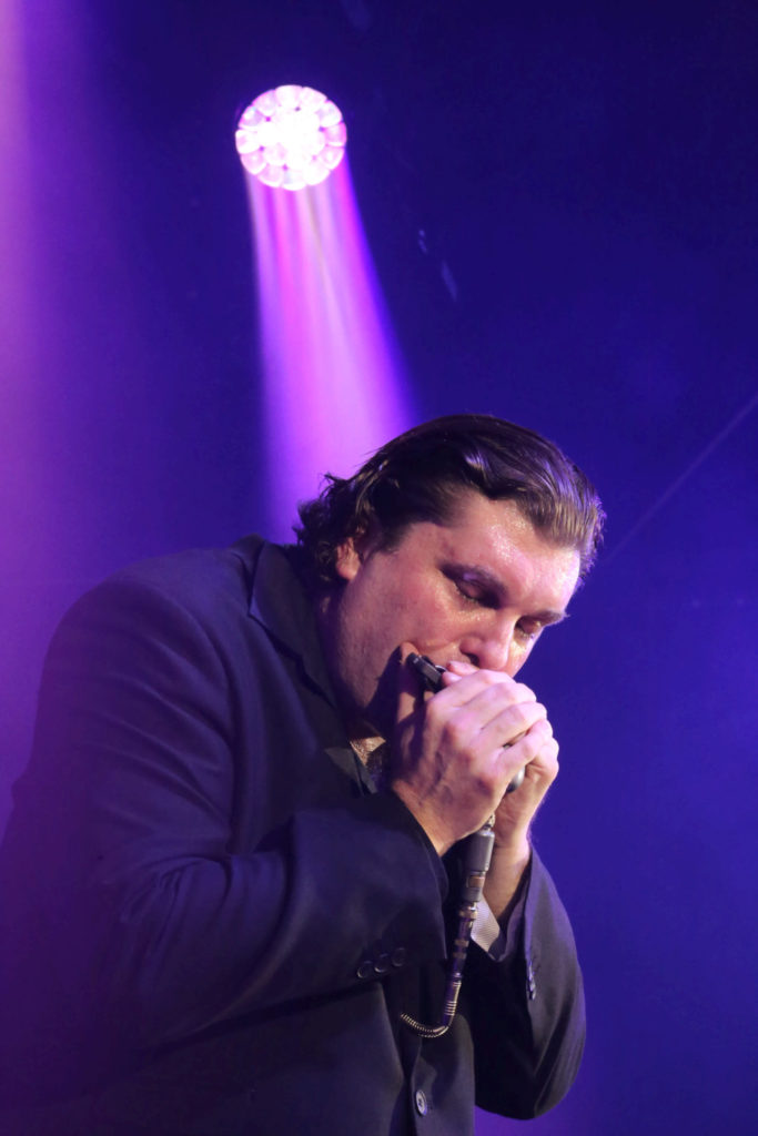 photo of blues harp virtuoso giles robson