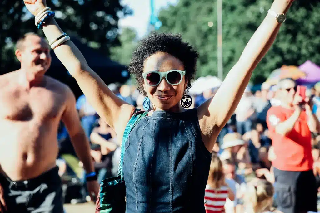 Ealing Blues Festival image of a woman in sunglasses enjoying the music